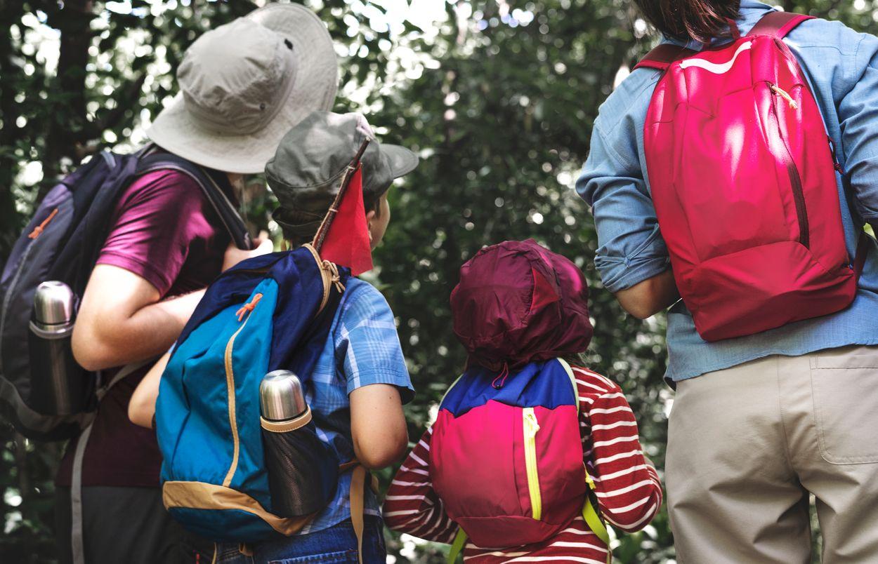 family-hiking-in-a-forest-PM2VRXT - TAHAN Outdoor