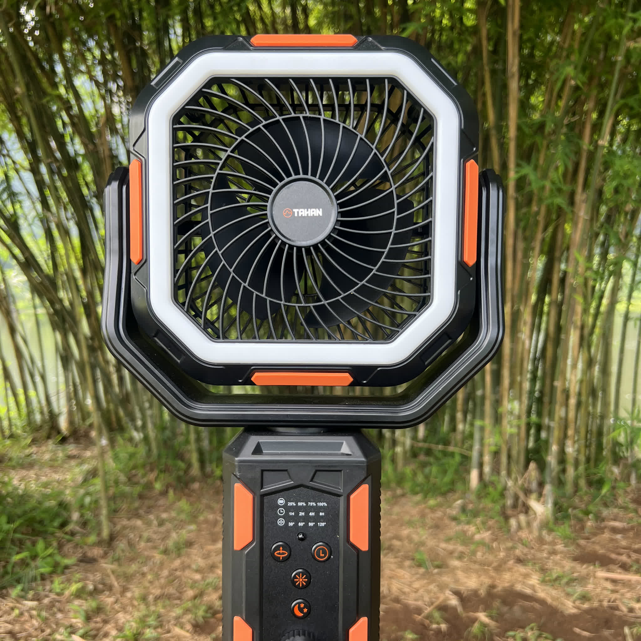 TAHAN Typhoon Pro running outdoors with its LED ring lit, bamboo grove behind