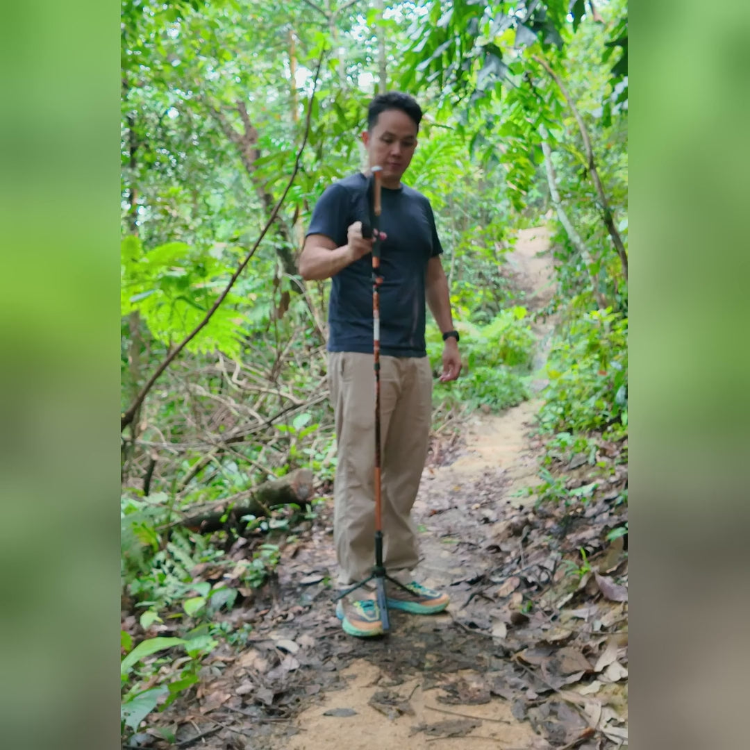 TAHAN foldable hiking TriStick demo: stands on its own, tripod legs fold out, phone mount turns 360, adjusts 63 to 135cm, folds in 3 into a side pocket
