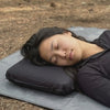 Lying comfortably on the GoSleep pillow, neck supported